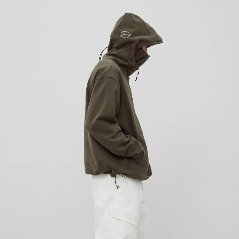 Olive tactical hoodie with integrated face mask, side view